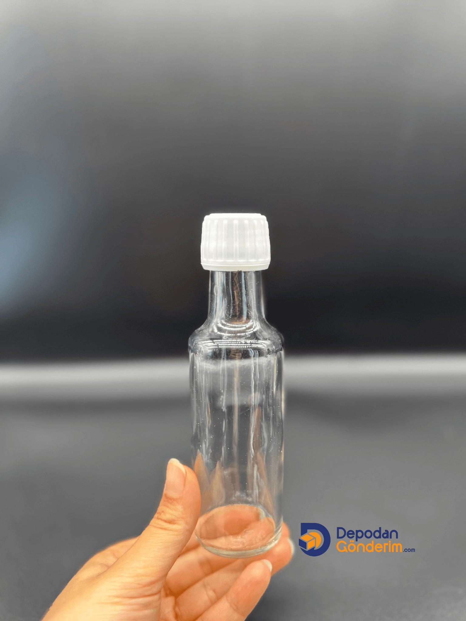 DP94 100cc DORİKA ŞEFFAF ŞİŞE- BEYAZ KİLİTLİ KAPAK 