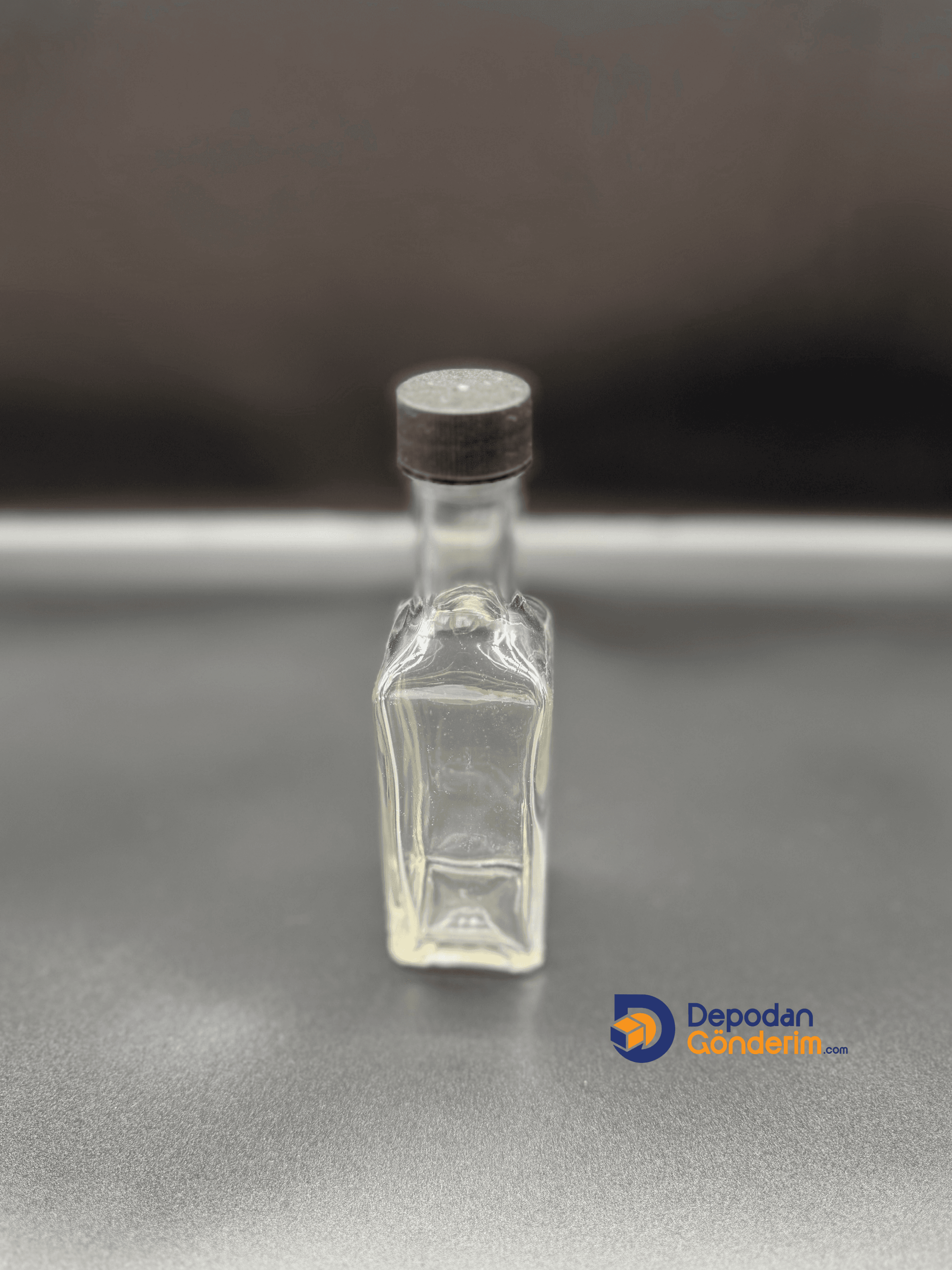 DP75 100cc ŞEFFAF MARASKE ŞİŞE - SİYAH KİLİTLİ KAPAKLI 