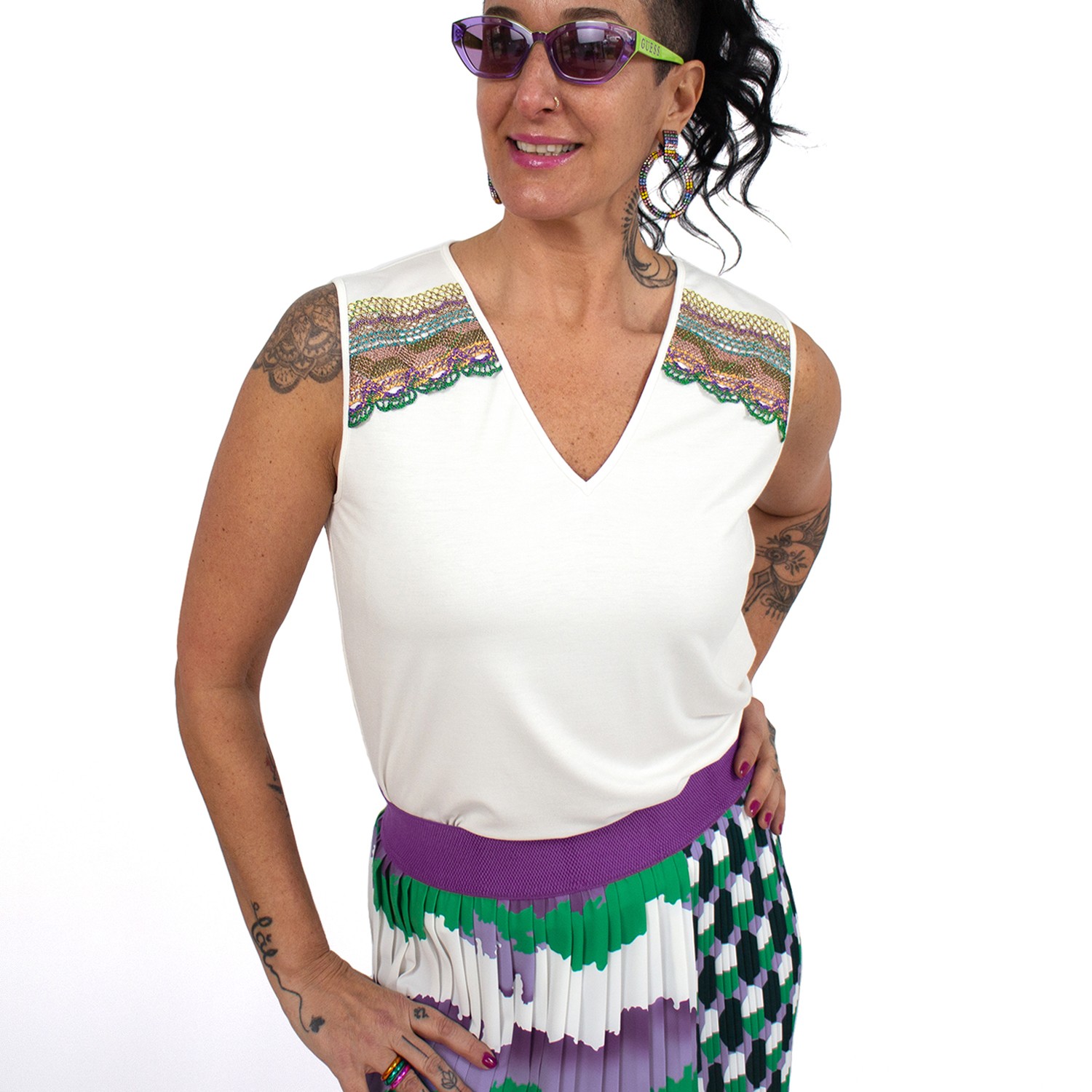 Sleeveless Blouse With Colorful Accessories On The Yoke