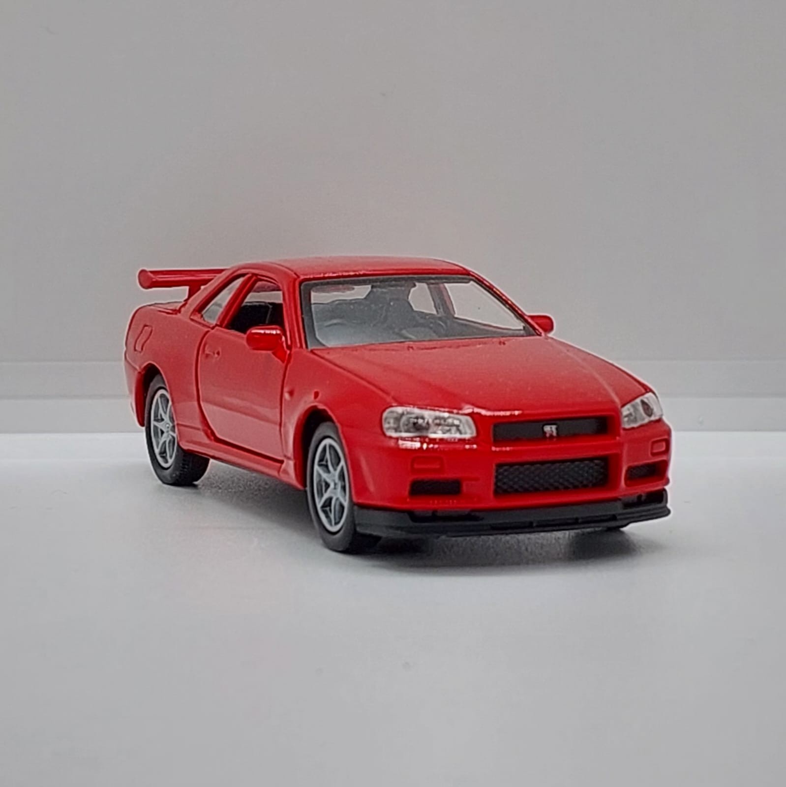 Welly Nissan Skyline GT-R R34 -1:36 Kırmızı