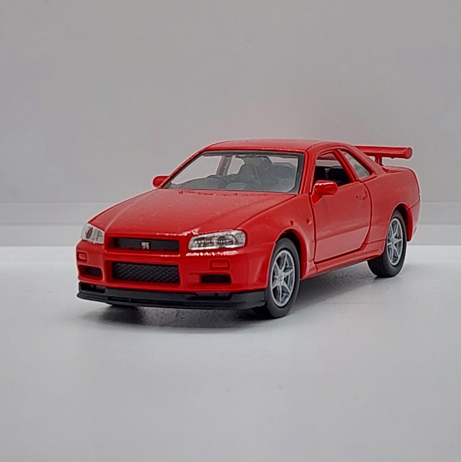 Welly Nissan Skyline GT-R R34 -1:36 Kırmızı