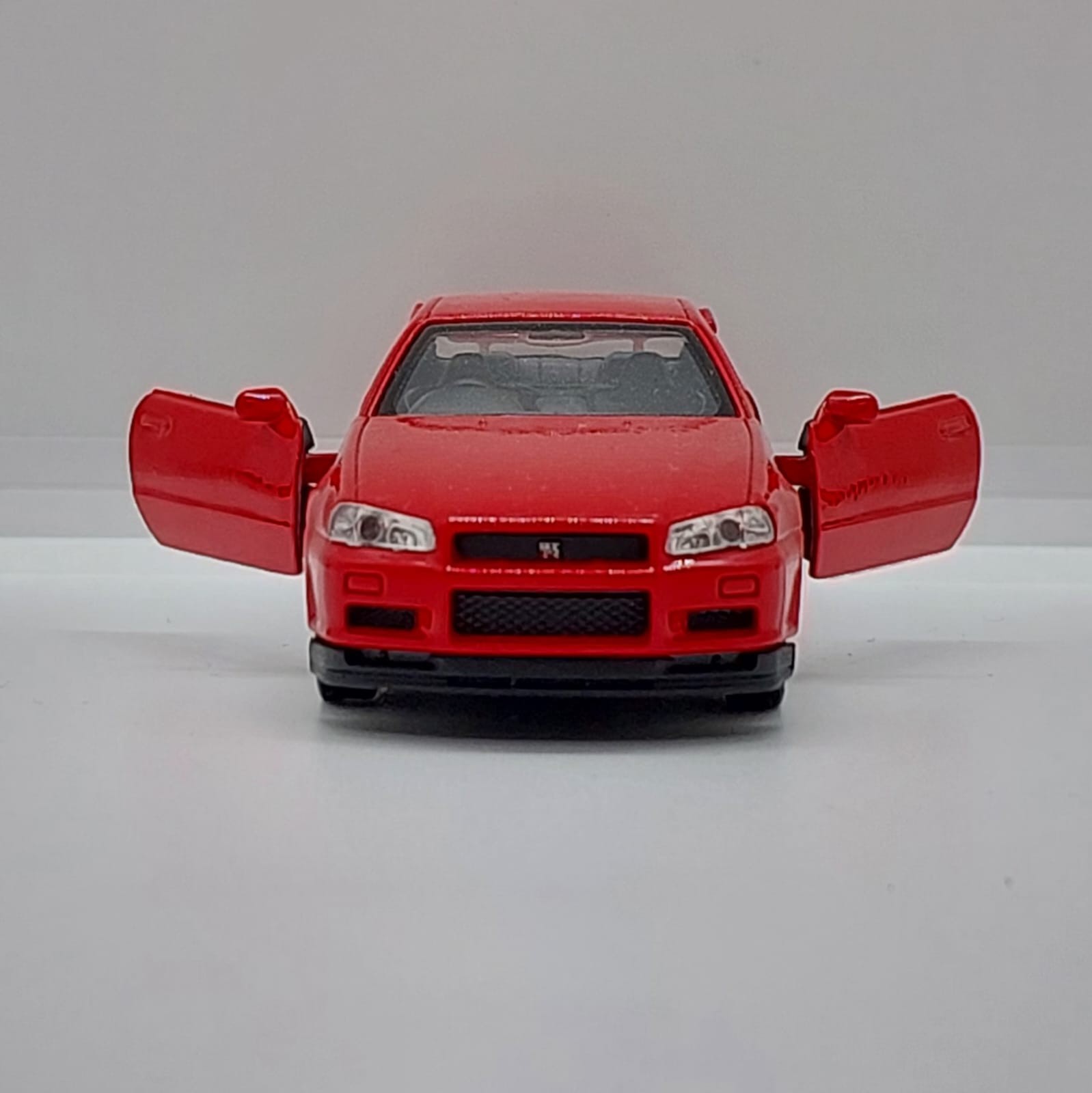 Welly Nissan Skyline GT-R R34 -1:36 Kırmızı