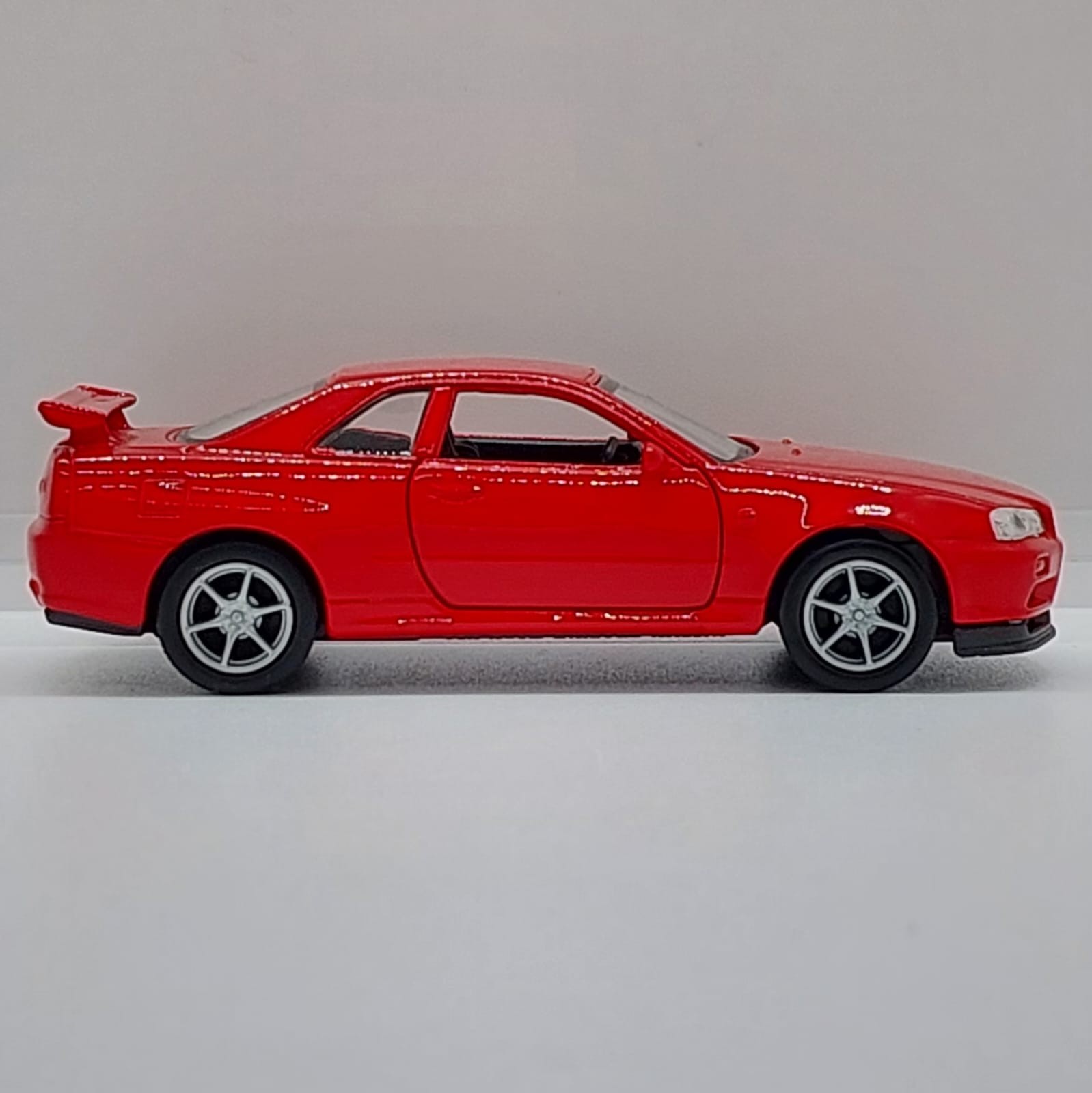 Welly Nissan Skyline GT-R R34 -1:36 Kırmızı