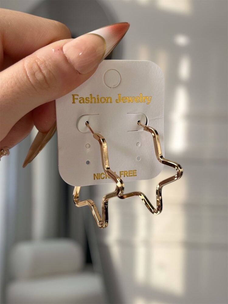 Gold yıldız küpe