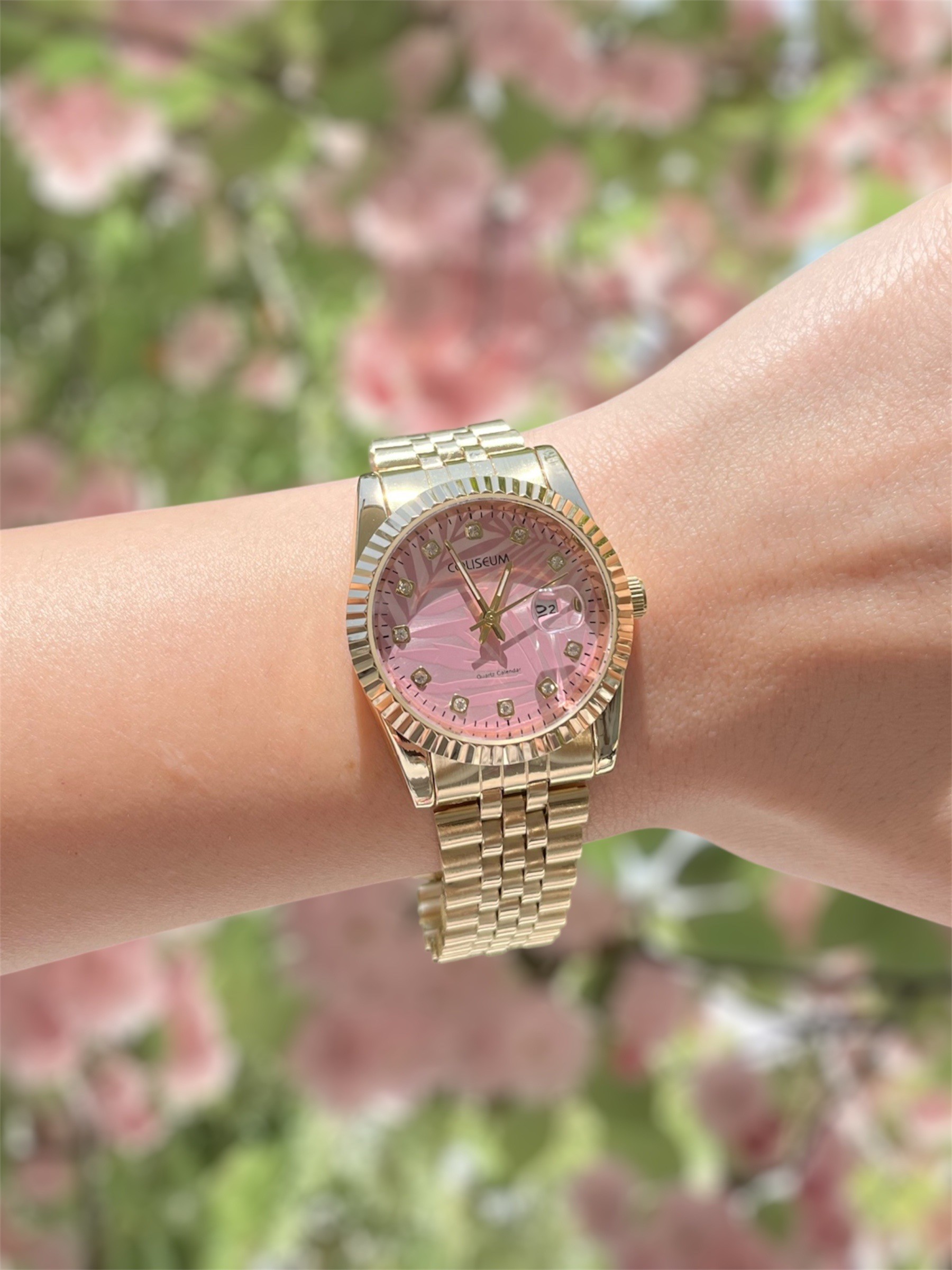 Pink role saat gold