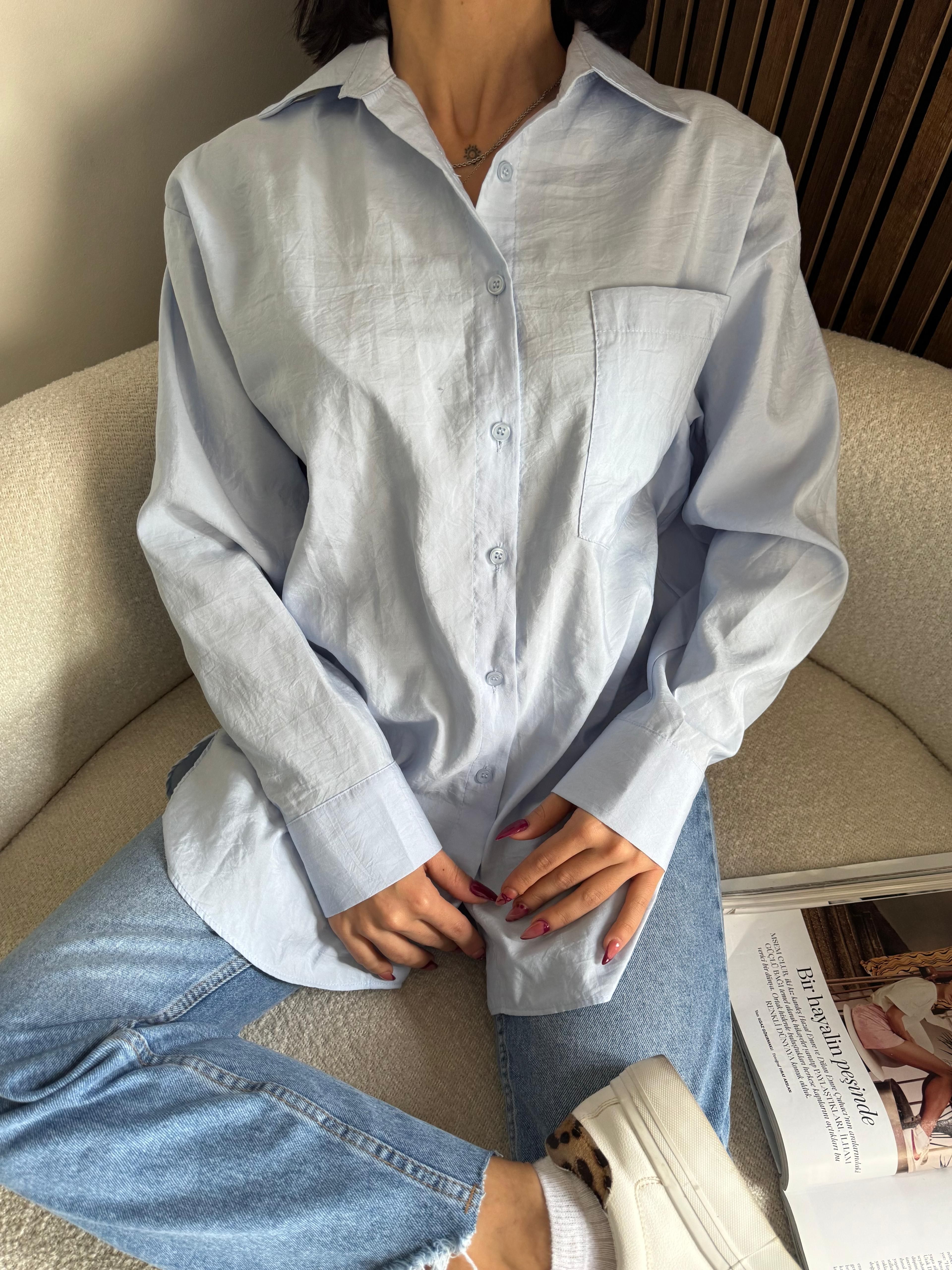 Paçası Yırtık Mom Jeans