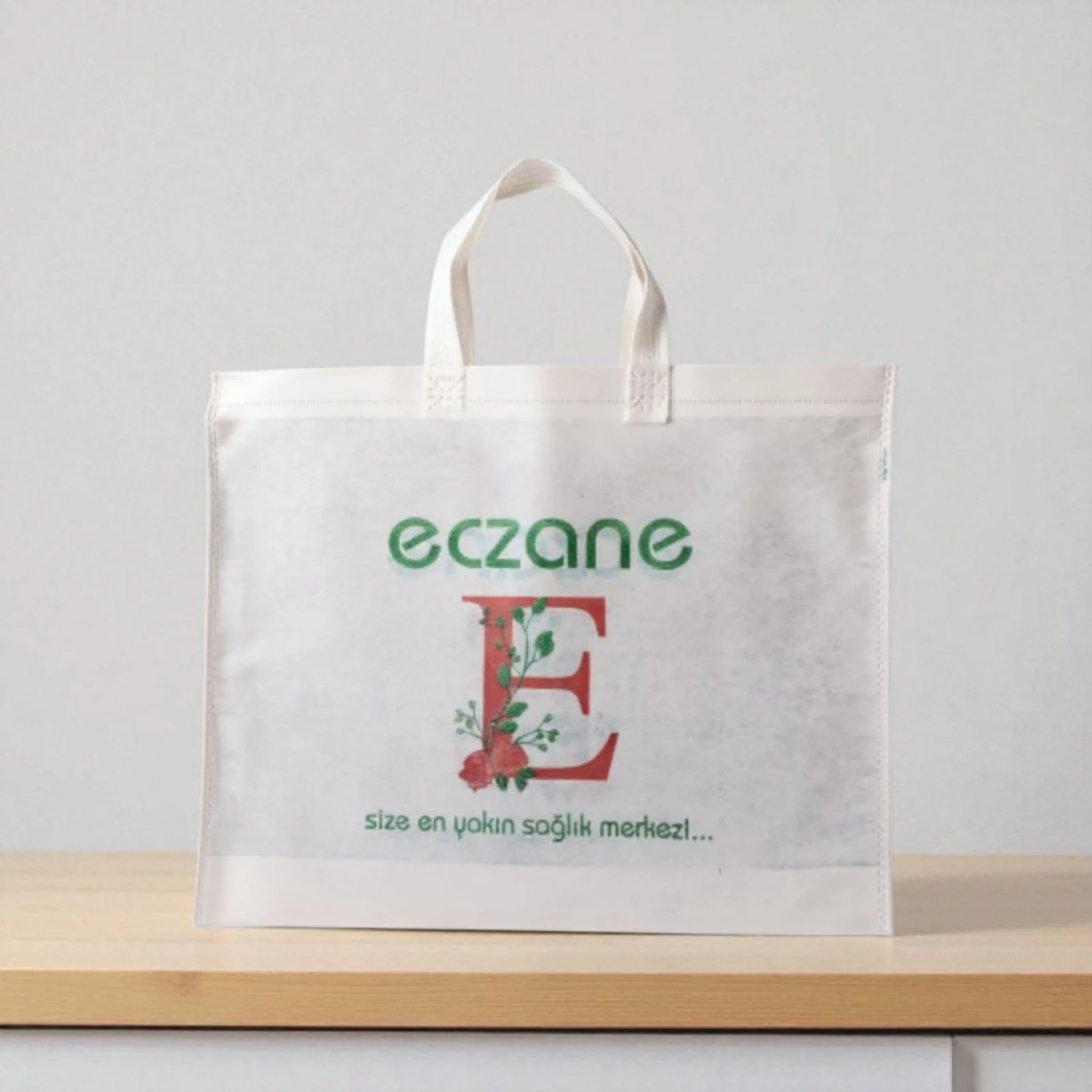 Emy Eczane Bez Çanta Kulplu Körüklü Gül Desen E Logolu 40x37x7 cm - 50 Adet