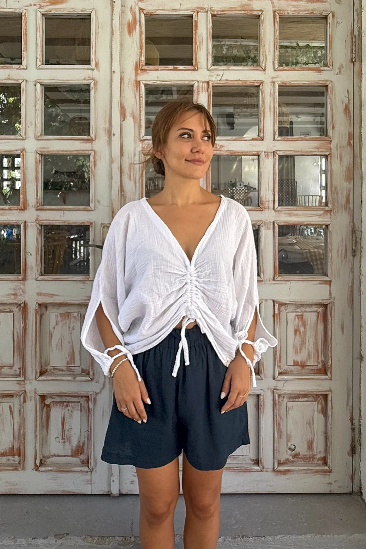 BÜZGÜ DETAYLI MÜSLİN BLUZ