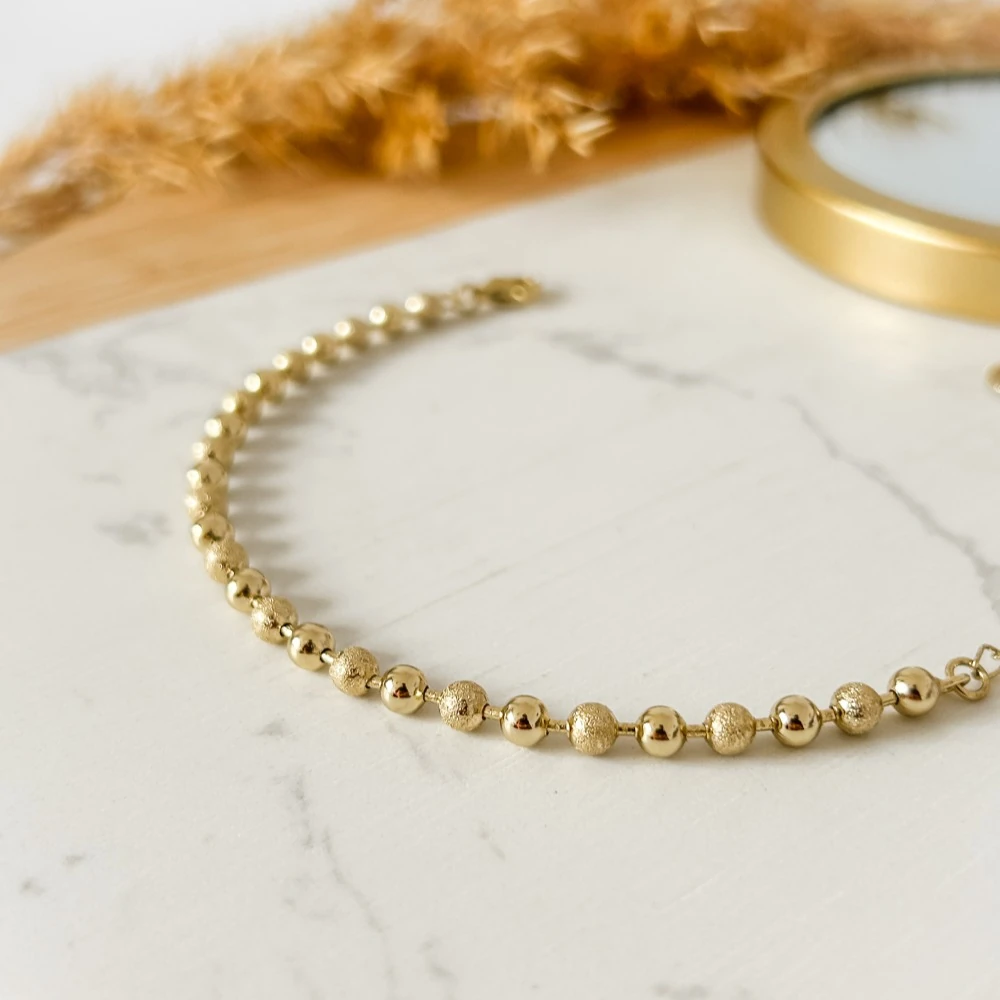 Dorika Desenli Altın Renkli Bileklik