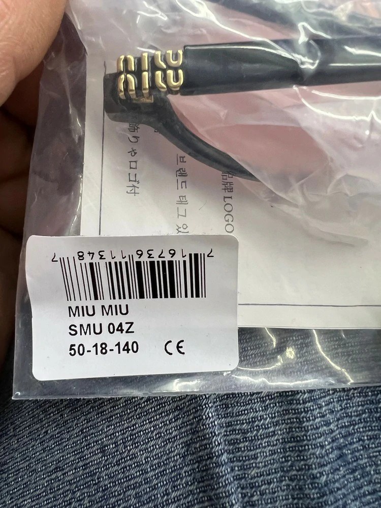 MIU MIU SMU 04Z 1AB-5S0 UNISEX