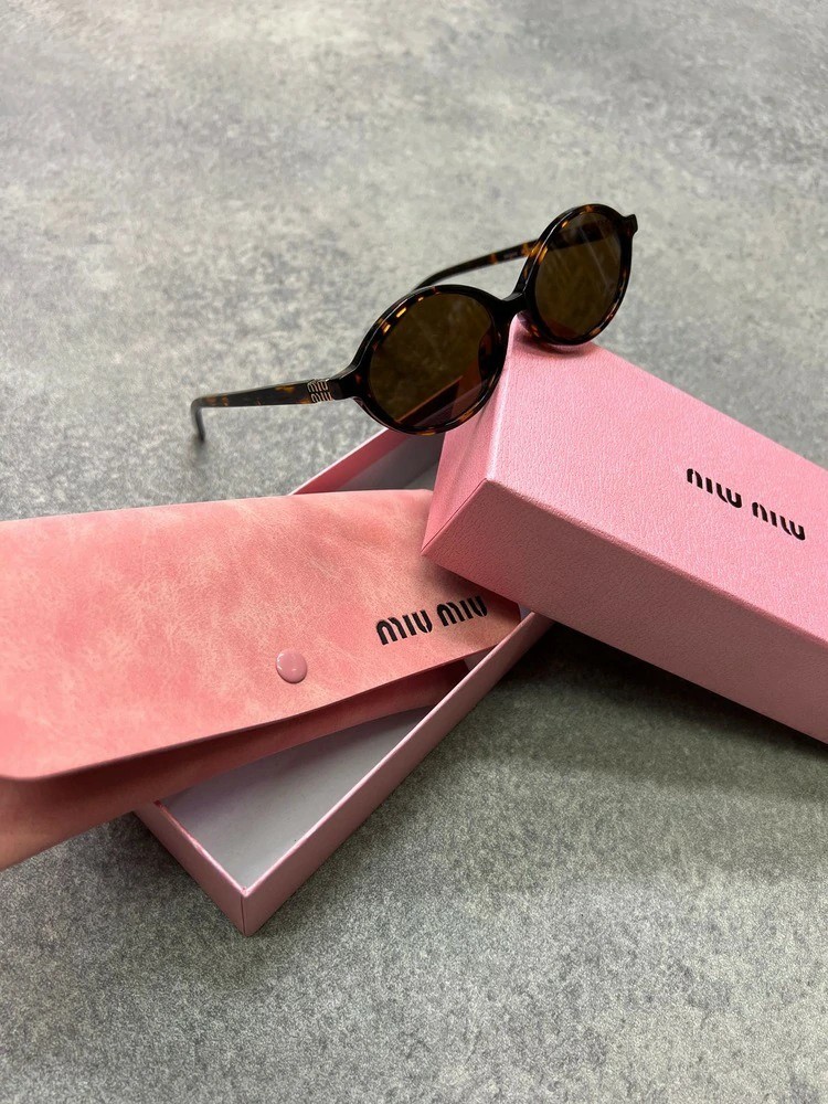 MIU MIU SMU 04Z 1AB-5S0 UNISEX