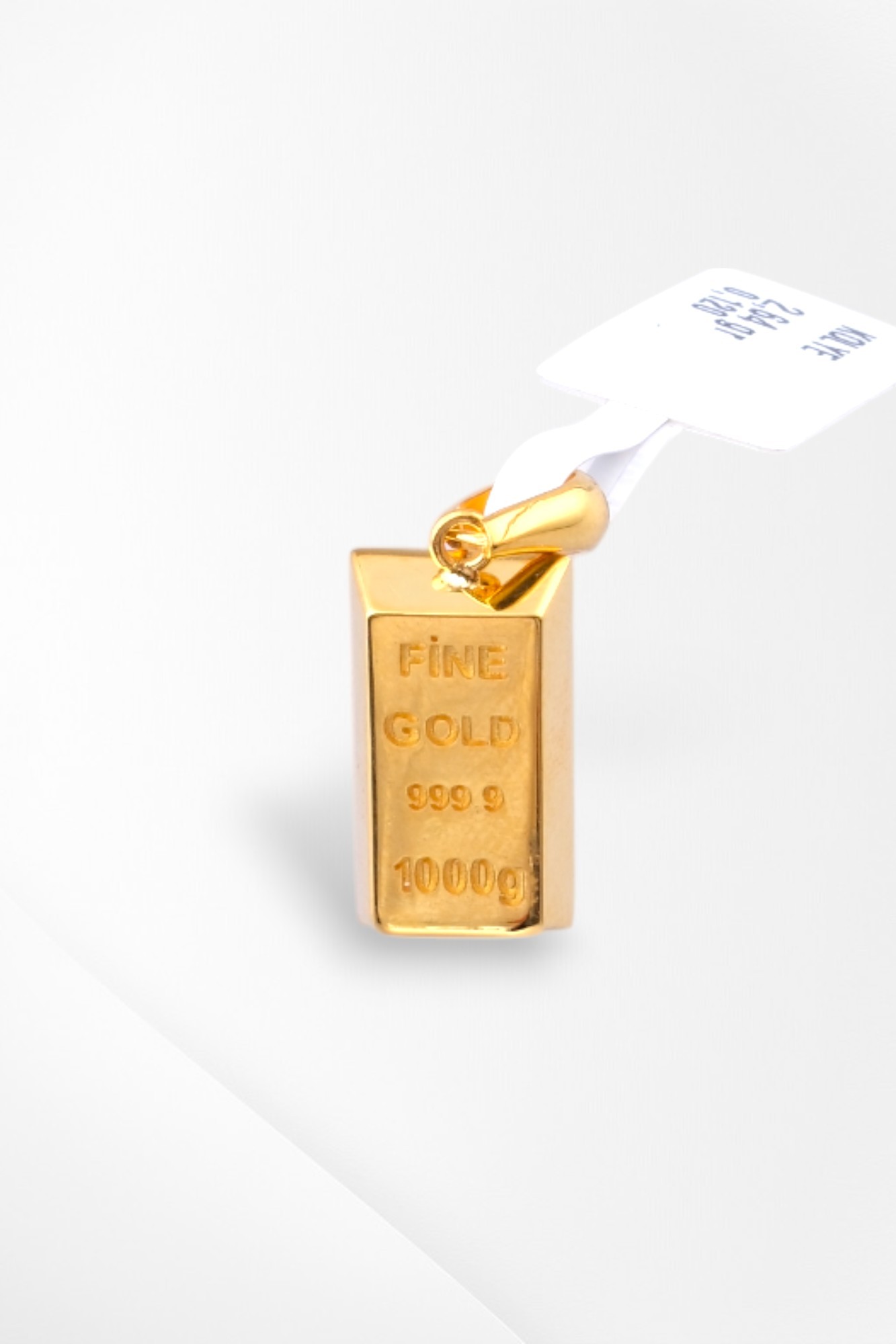 Külçe Altın Figürlü 'Fine Gold 999.9' Yazılı 22 Ayar Altın Kolye Ucu - Yatırım ve Şıklık - Alimoğlu Kuyumculuk 2,64 GR Ürün Kodu: KLY5274