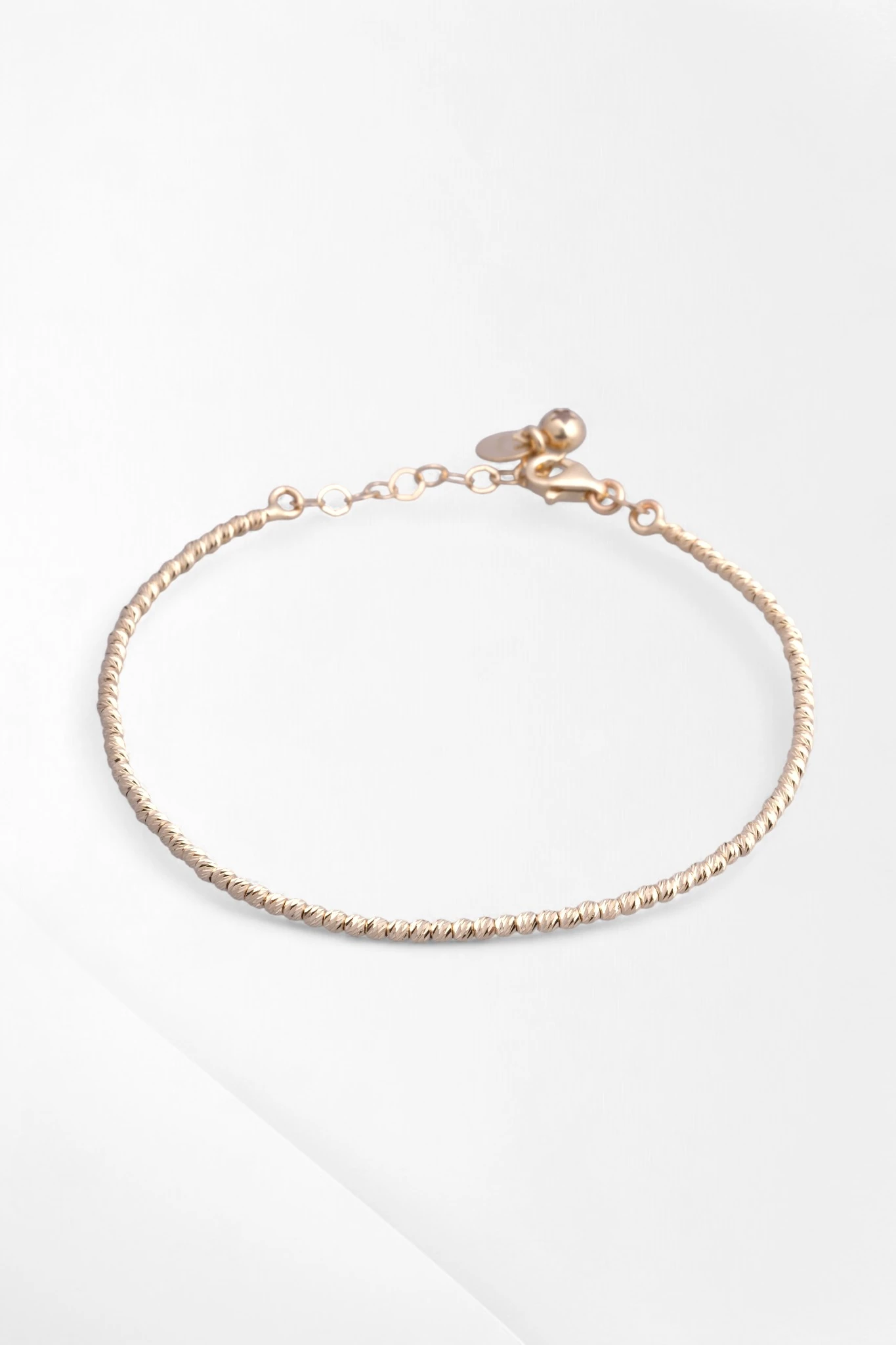 Zamansız Işıltı: 14 Ayar Altın Dorika Toplu (Top Top) Bileklik 17-20CM Ayarlı 3,77 GR Ürün Kodu: KNY6199