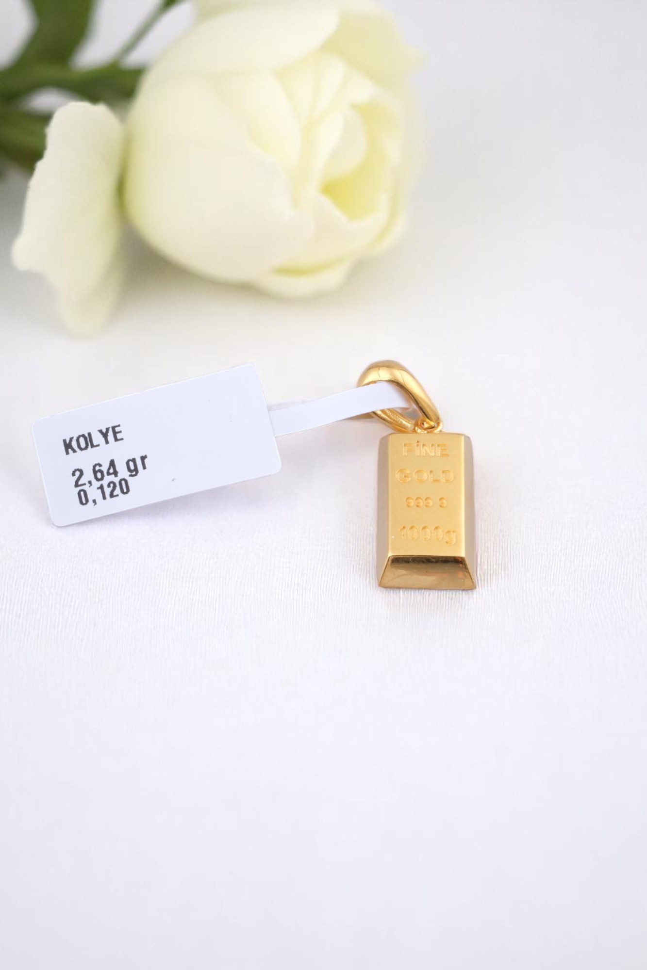 Külçe Altın Figürlü 'Fine Gold 999.9' Yazılı 22 Ayar Altın Kolye Ucu - Yatırım ve Şıklık - Alimoğlu Kuyumculuk 2,64 GR Ürün Kodu: KLY5274