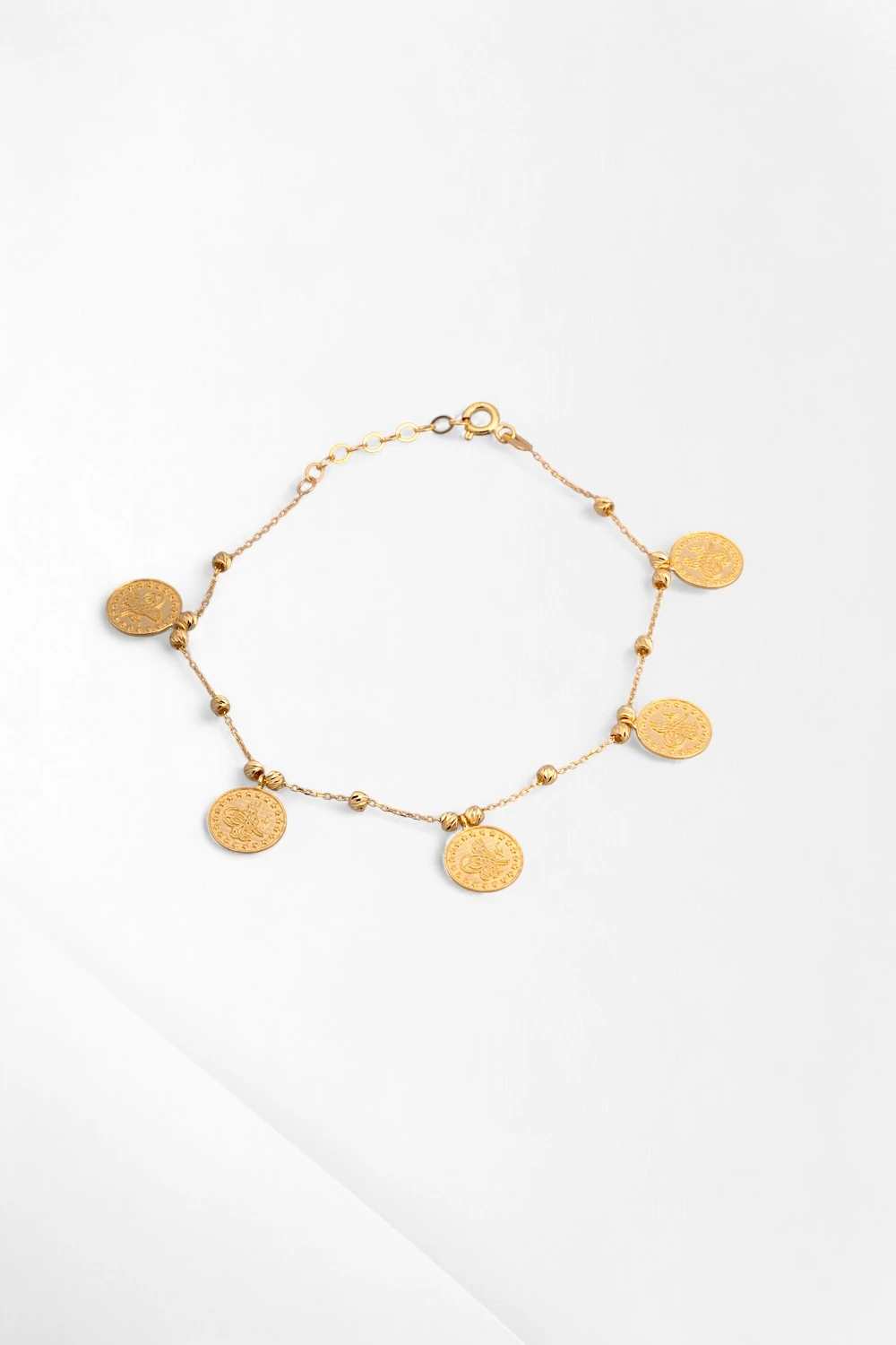 14 Ayar Altın Liralı ve Dorika Toplu Bileklik: Geleneksel Zarafet ve Modern Işıltı 3,48 GR Ürün Kodu: KLY5464