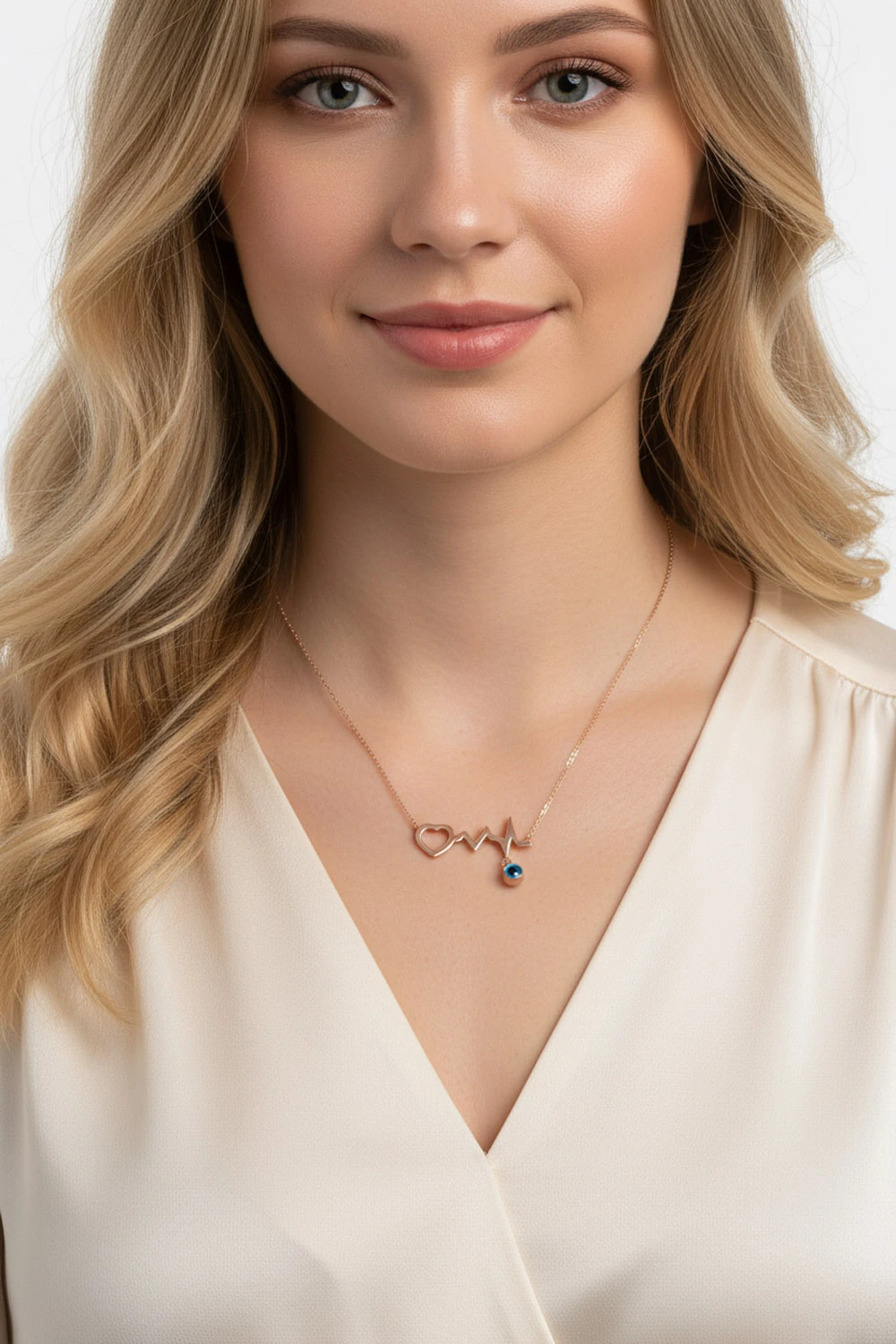 14 Ayar Altın Kalp Atışı Kolye: Aşkın Ritmini Taşıyan Nazar Boncuklu Zarif Tasarım 2,17 GR Ürün Kodu: KLY5458