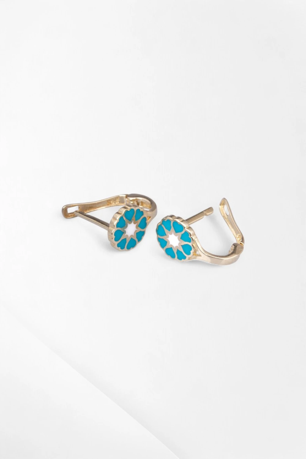 Kalbimin Gökyüzü: 14 Ayar Altın Turkuaz Kalpli Çocuk Küpesi 1,33 GR Ürün Kodu: KP07429