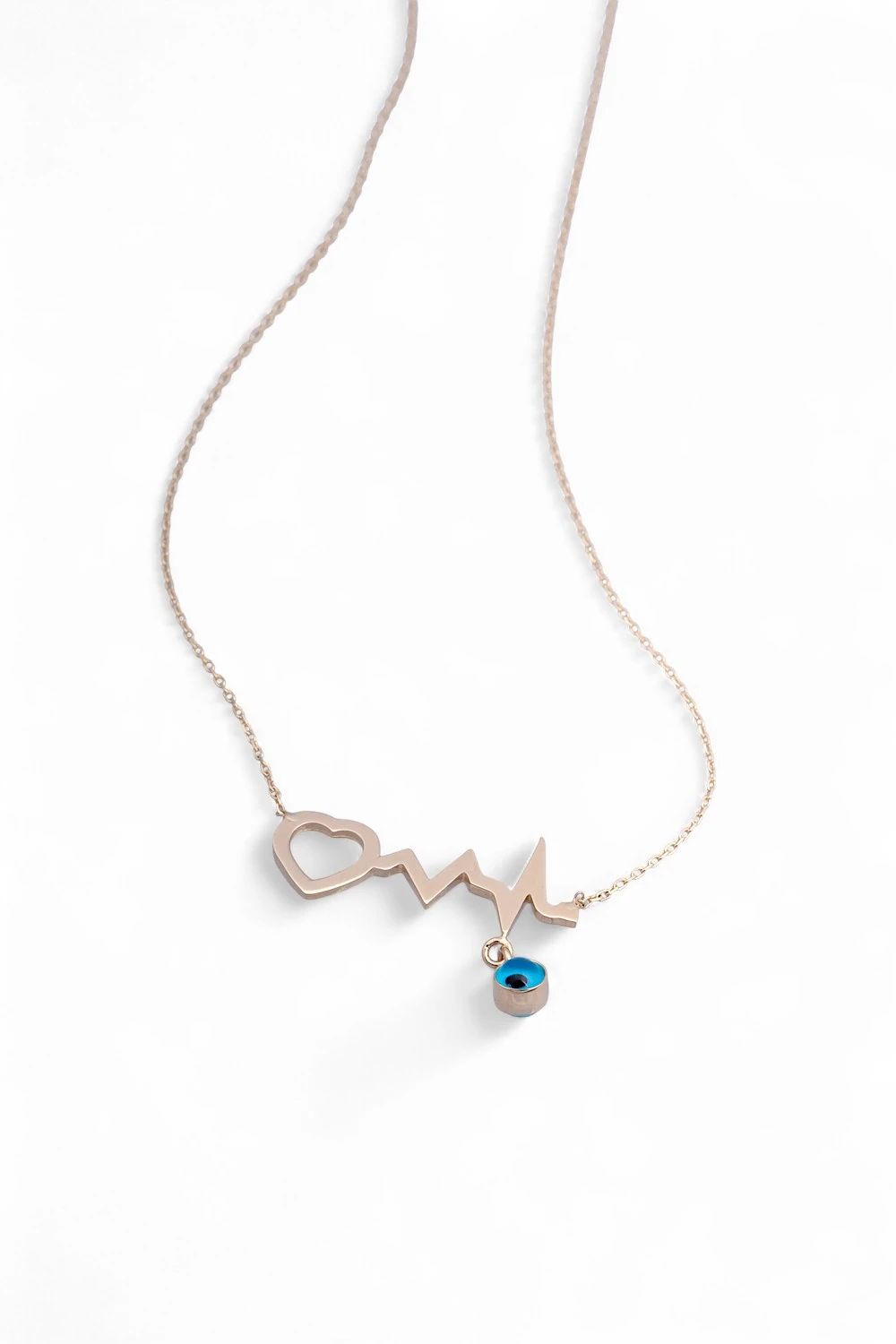 14 Ayar Altın Kalp Atışı Kolye: Aşkın Ritmini Taşıyan Nazar Boncuklu Zarif Tasarım 2,17 GR Ürün Kodu: KLY5458