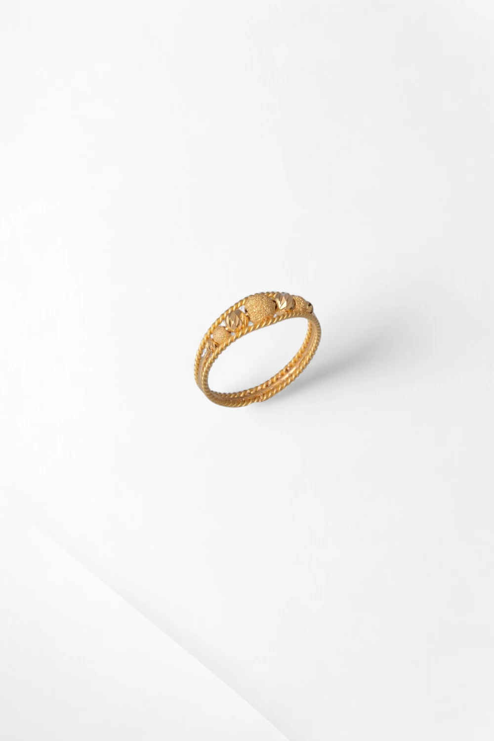 Işıltılı Taneler: 22 Ayar Çift Sıra Burgu Tasarım Yüzük 3,83 GR Ürün Kodu: YZ05072