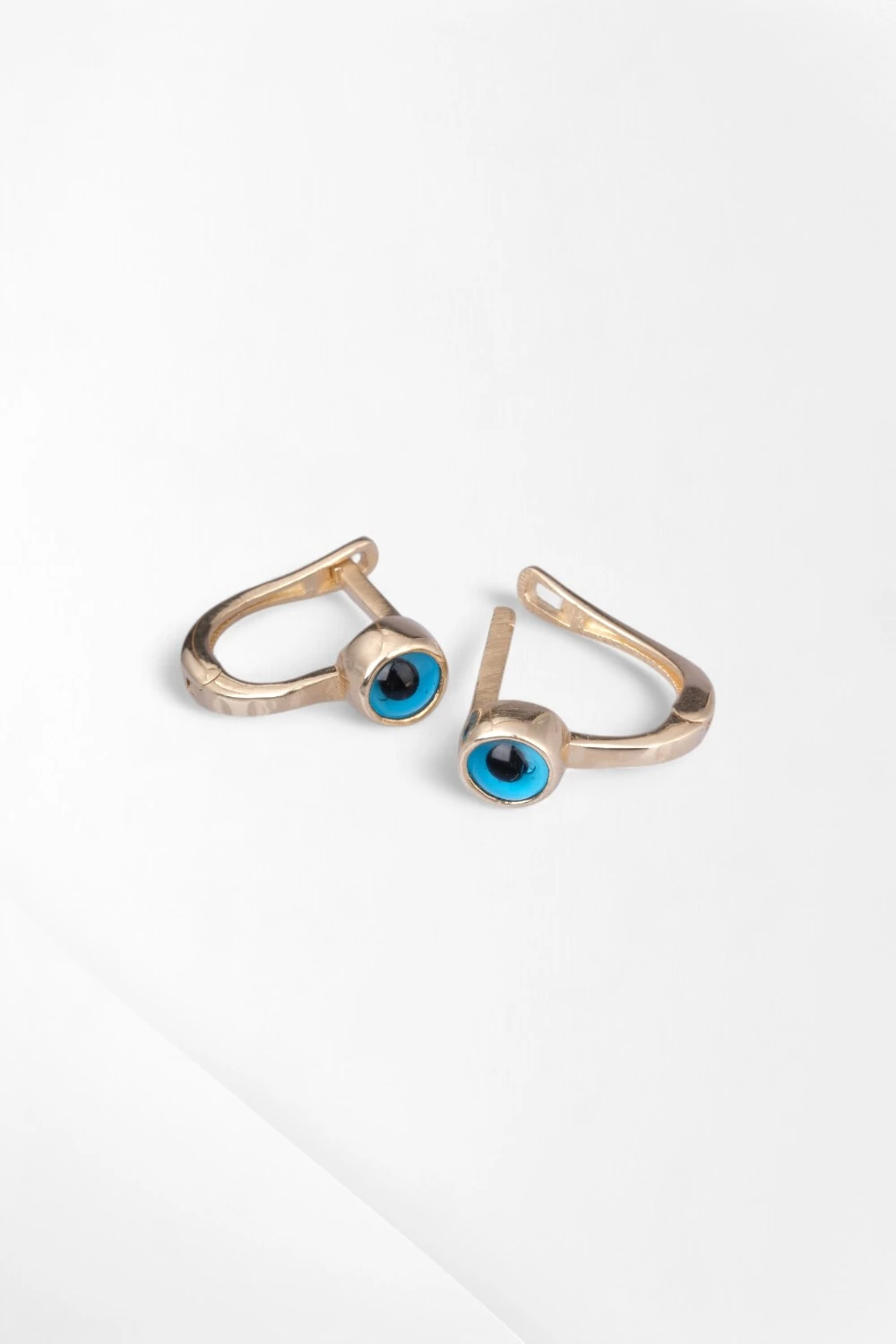 Sade ve Büyüleyici: 14 Ayar Turkuaz Nazar Boncuğu Çocuk Küpesi 1,52 GR Ürün Kodu: KP07503