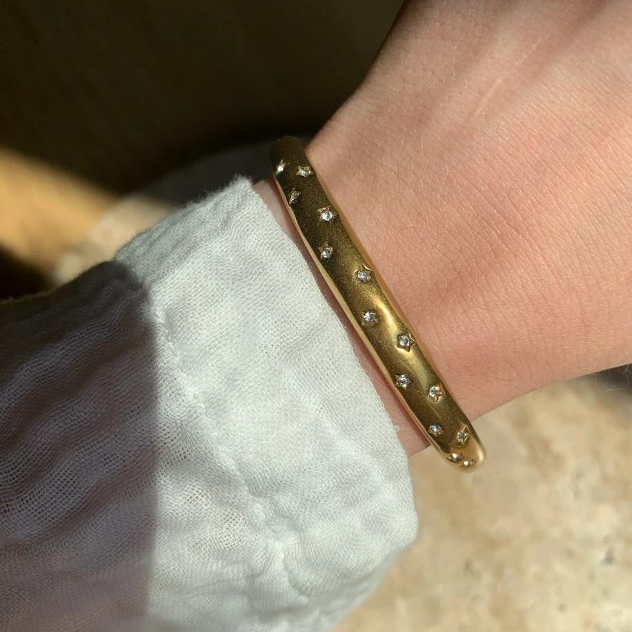 Çelik kristal taş yıldız işlemeli kelepçe