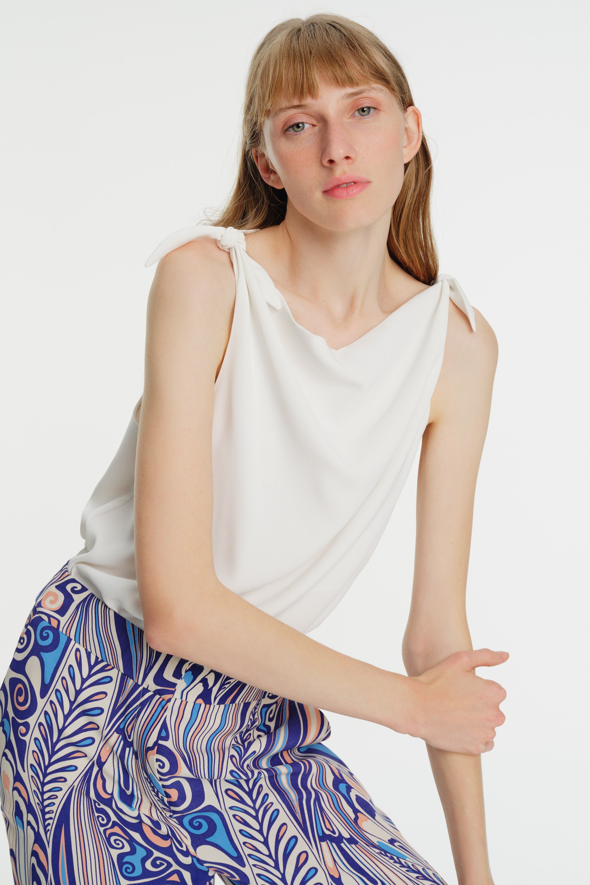 Drape Neck Sleeveless Blouse