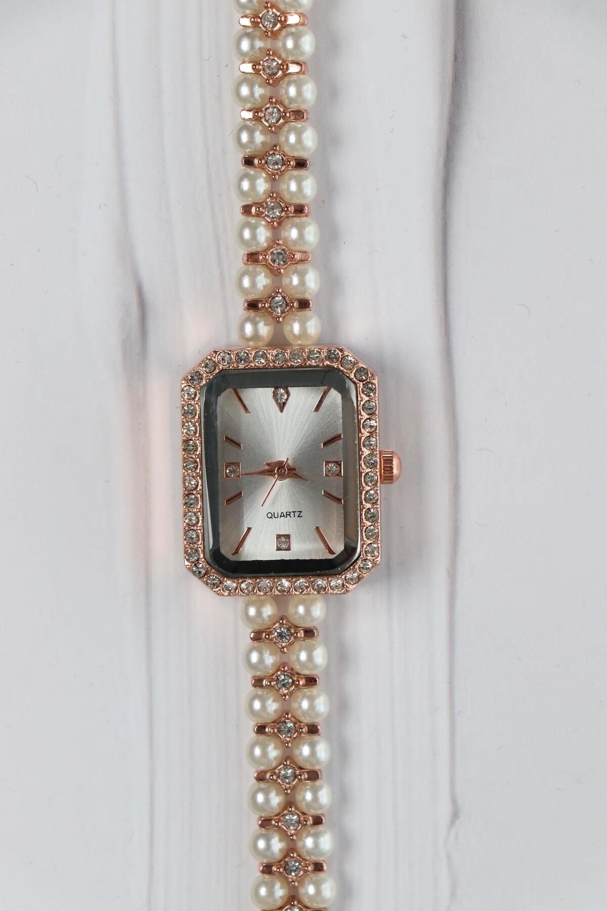 Ruby Minimal Vintage Model İnci Kordon Kadın Kol Saati Rose (Beyaz Kadran)