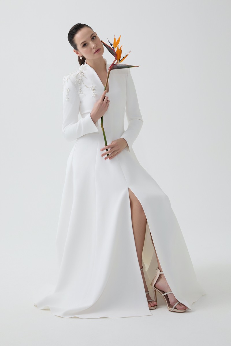 R85 - High V-Neck, Padded Shoulders, Long Sleeves, Embroidered Shoulder Details, Paneled Flared Skirt, Pockets, Full-Length Dress