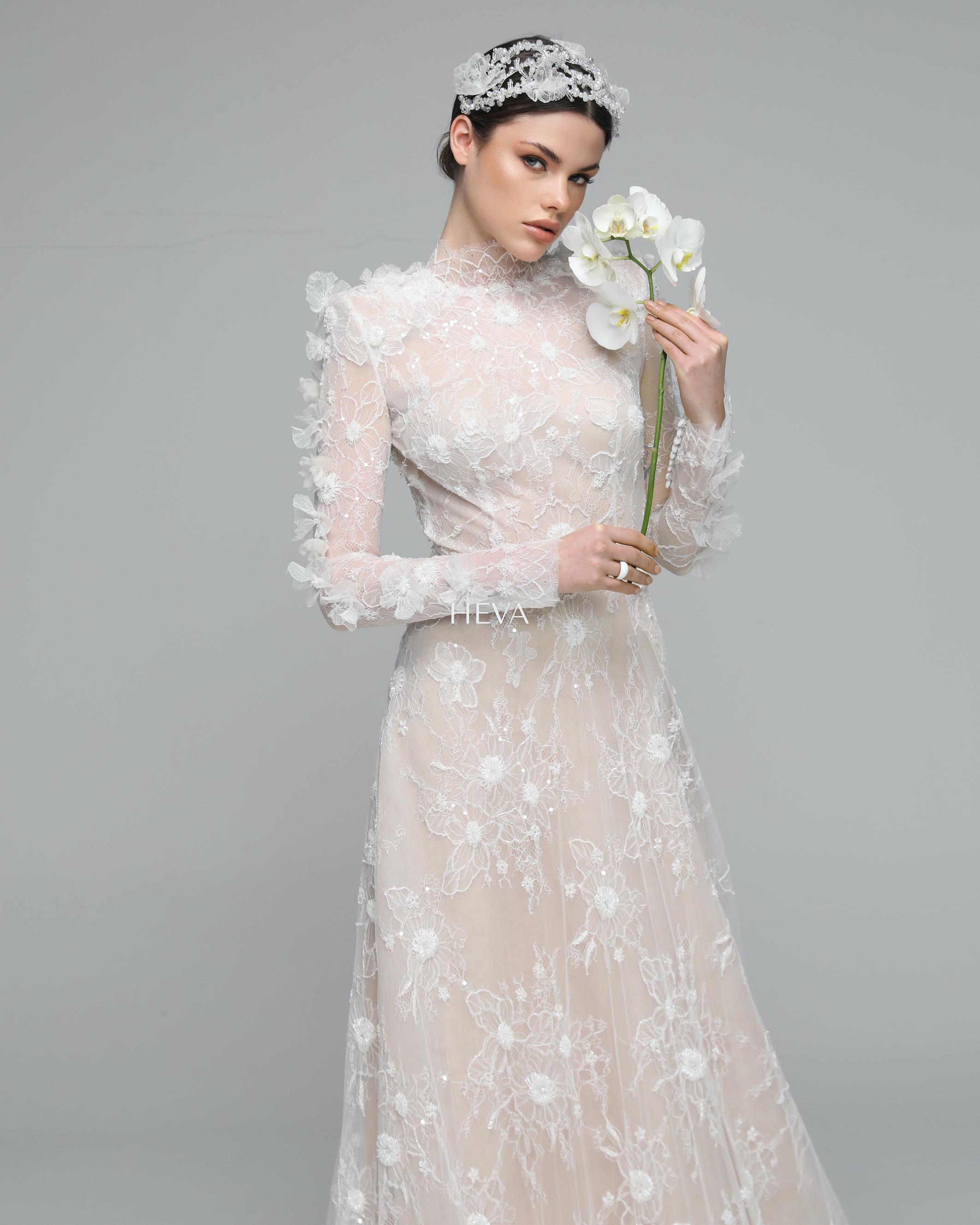HV22015 - Low-Cut Back, Long-Sleeved Wedding Gown with Transparent Bodice, Layered and Frilled Back, Lightly Pleated Skirt, Fully French Lace Overlay and Three-Dimensional Flower Embellishments
