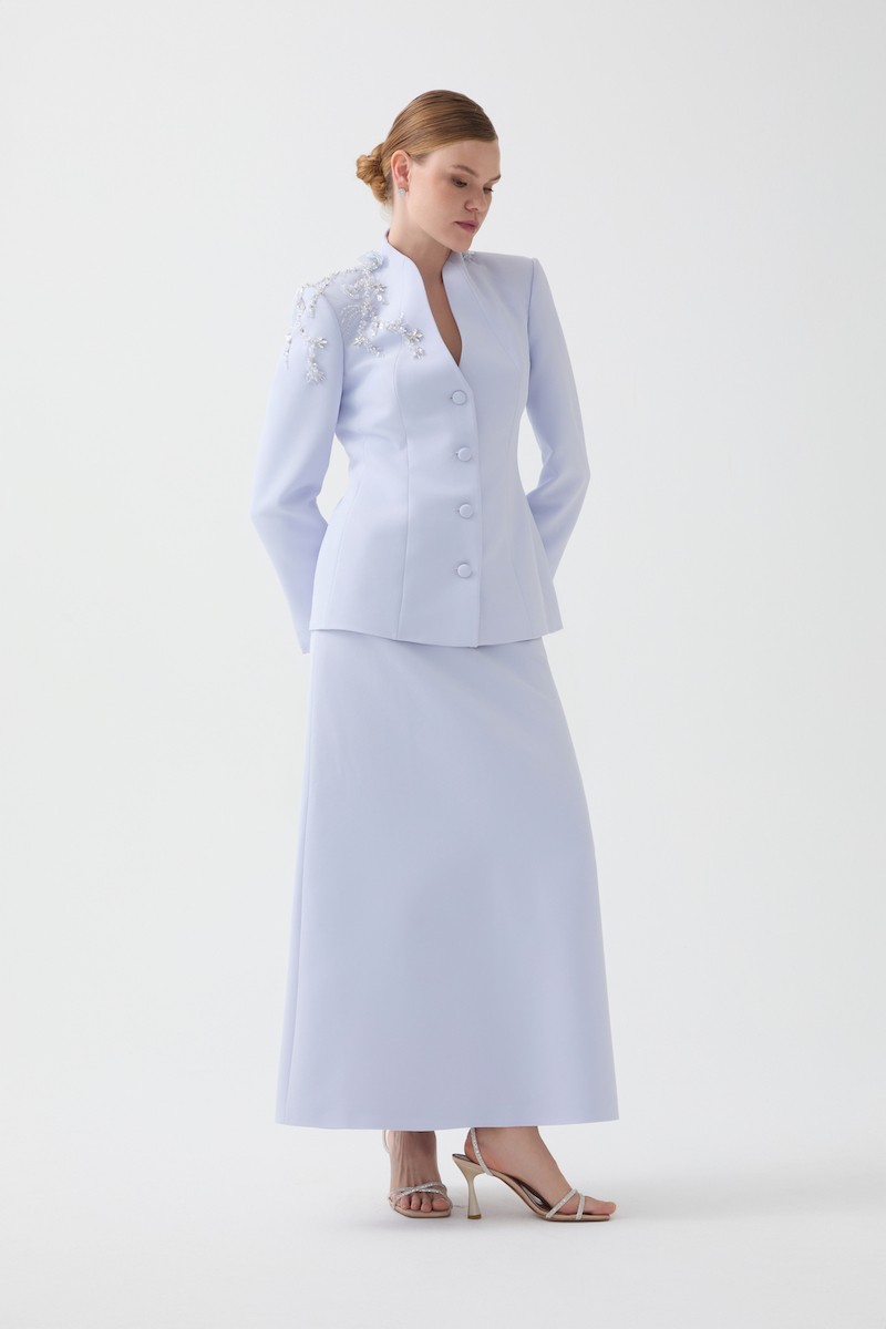 R116 - High V-Neckline, Padded Shoulders, Long Sleeves, Embroidered Shoulder Details, Fabric-Covered Front Buttons, A-Line Cut, Two-Piece Suit