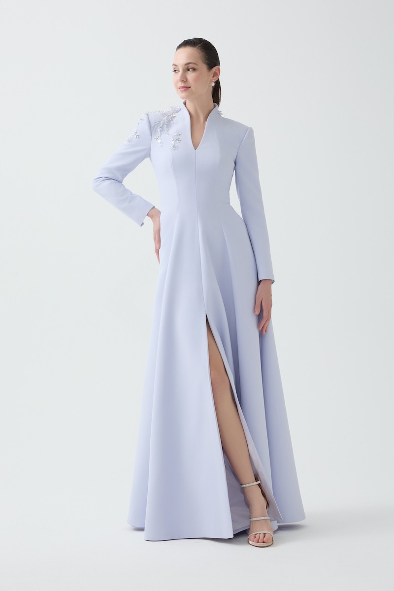 R85 - High V-Neck, Padded Shoulders, Long Sleeves, Embroidered Shoulder Details, Paneled Flared Skirt, Pockets, Full-Length Dress