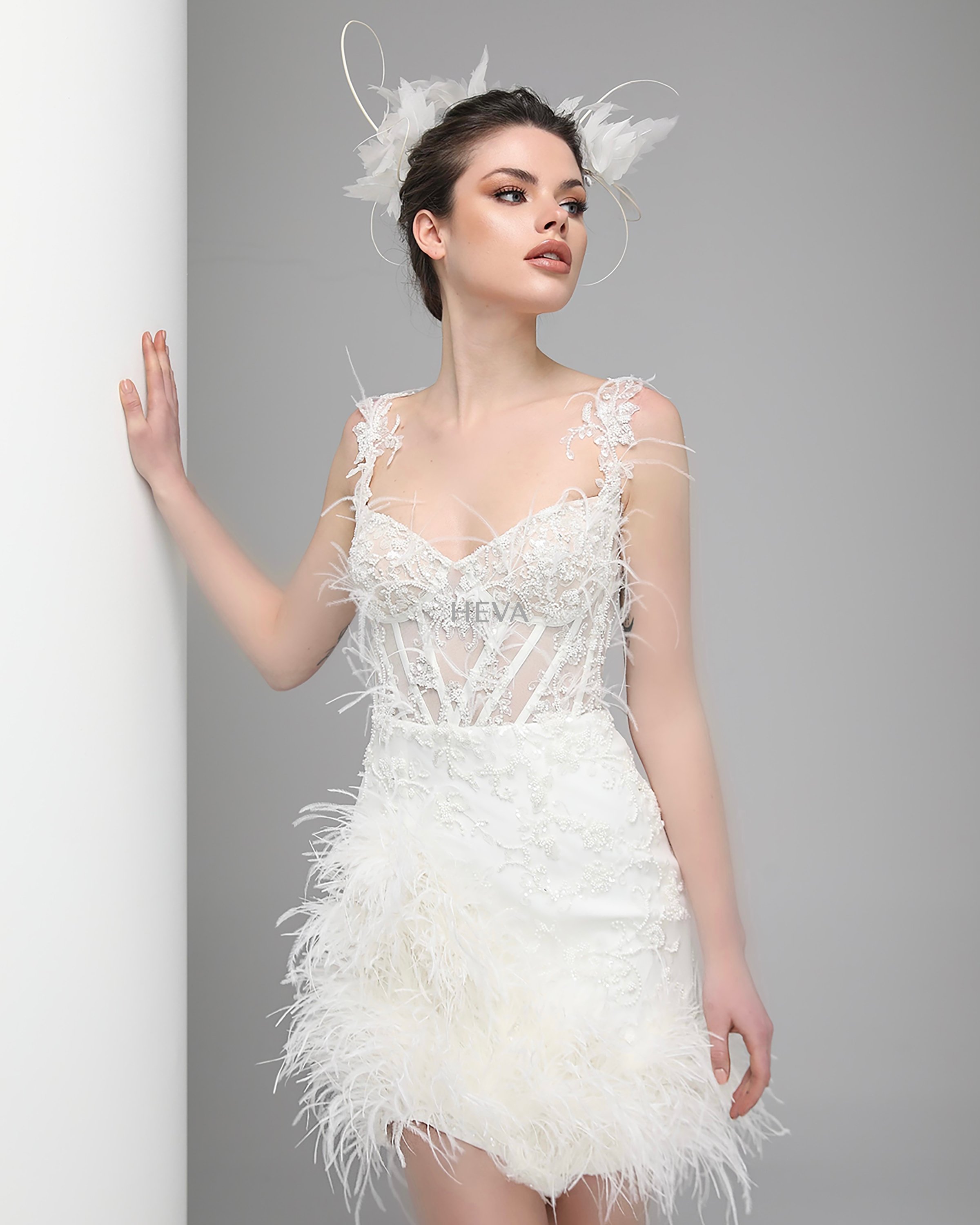 HV22101 - Strapless, M-Neck, Corset-Bodiced Party Dress with Asymmetrical Cut, Embellished with Beads and Feathers