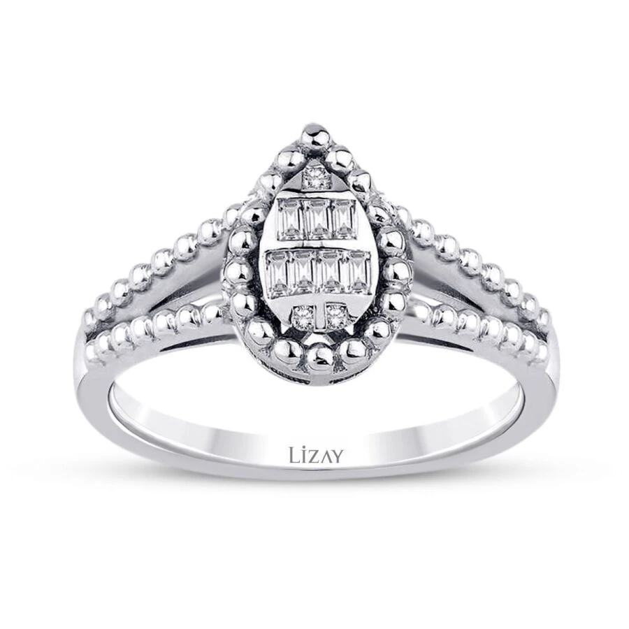 0.12 Carat Diamond Pear Baguette Ring
