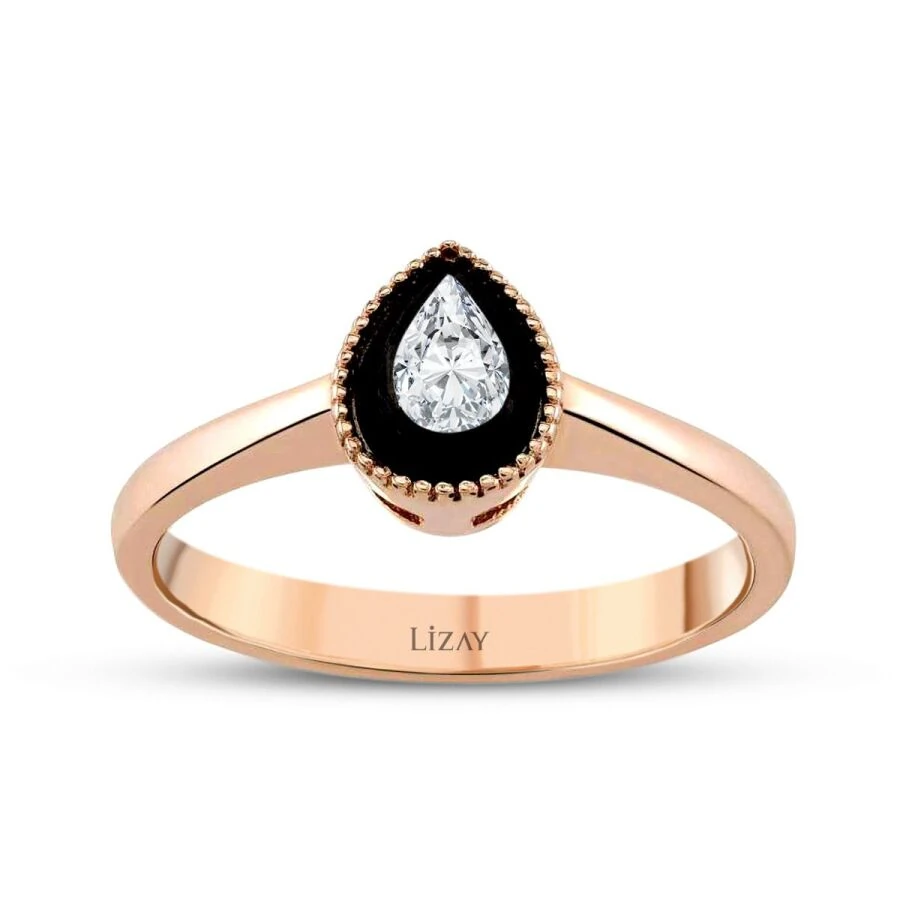 0.09 Carat Diamond Pear Solitaire Engagement Ring