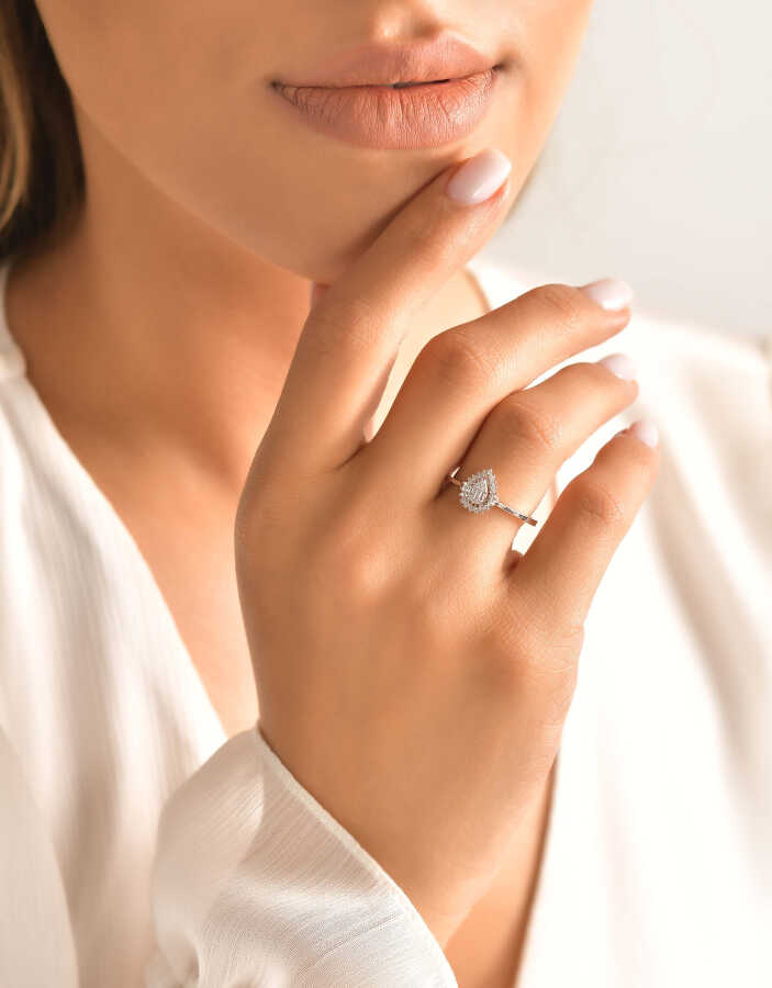 0.22 Carat Diamond Baguette Pear Ring