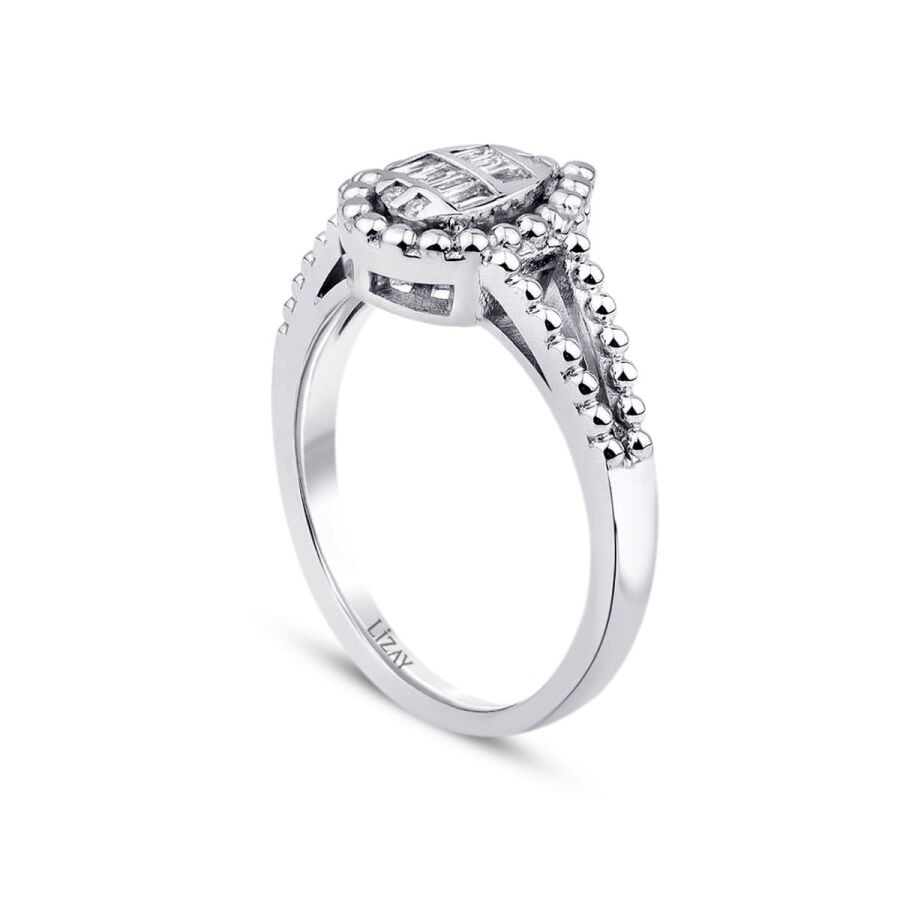 0.12 Carat Diamond Pear Baguette Ring
