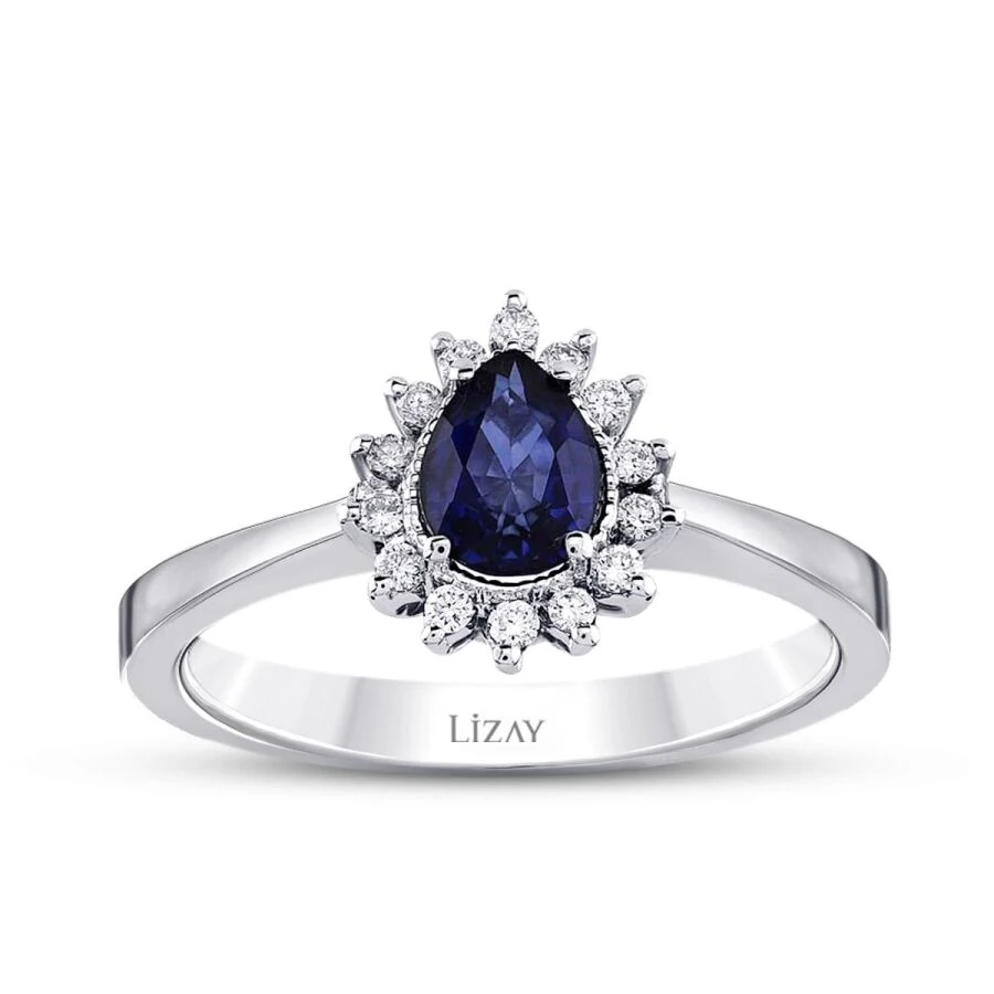 0.83 Carat Diamond Pear Sapphire Ring