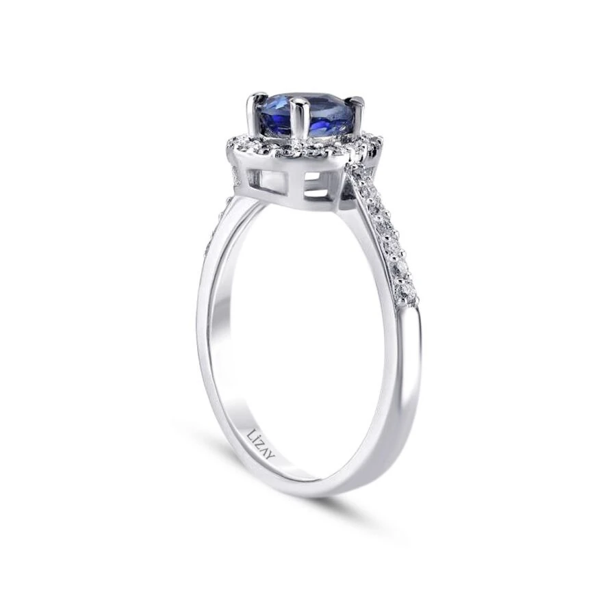 0.70 Carat Diamond Pear Sapphire Ring