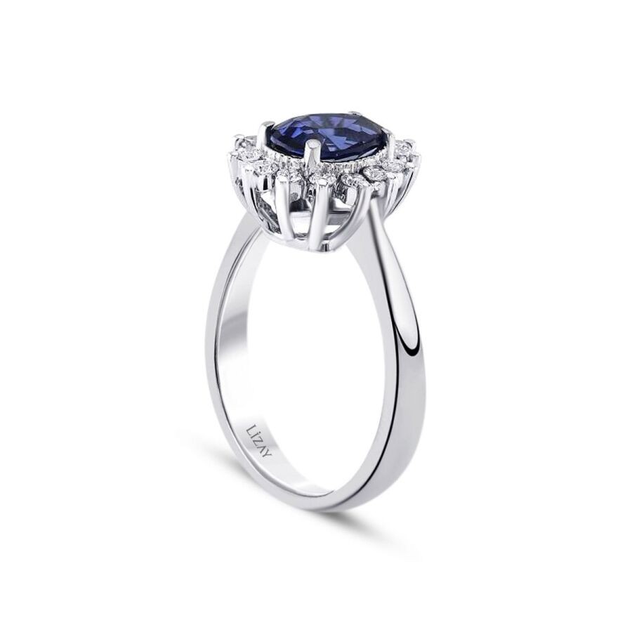 0.83 Carat Diamond Pear Sapphire Ring