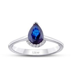 0.84 Carat Diamond Pear Sapphire Ring