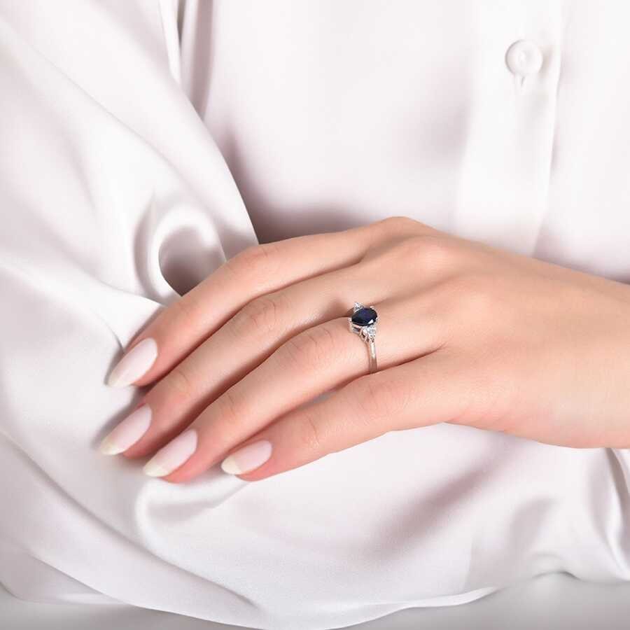 1.32 Carat Diamond Pear Sapphire Ring