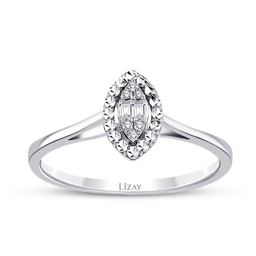 0.06 Karat Diamond Pear Baguette Ring