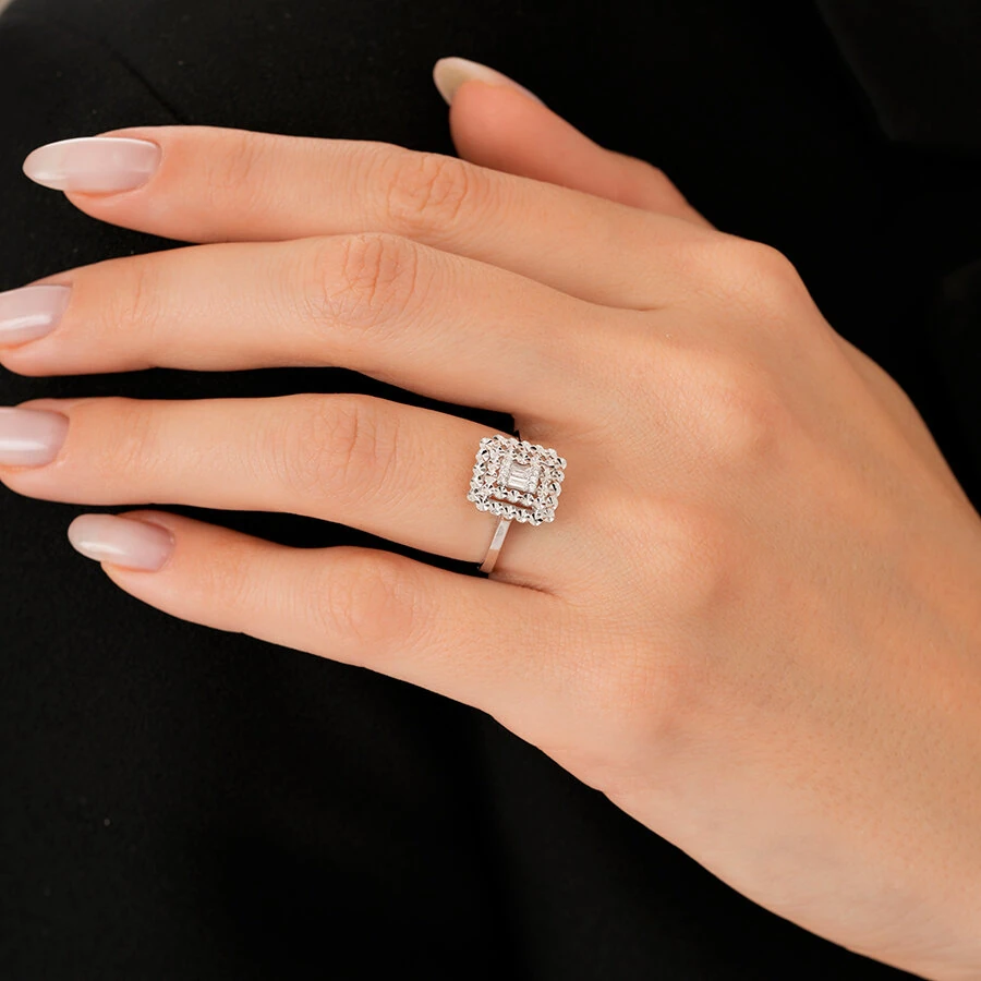 0.08 Carat Diamond Baguette Ring