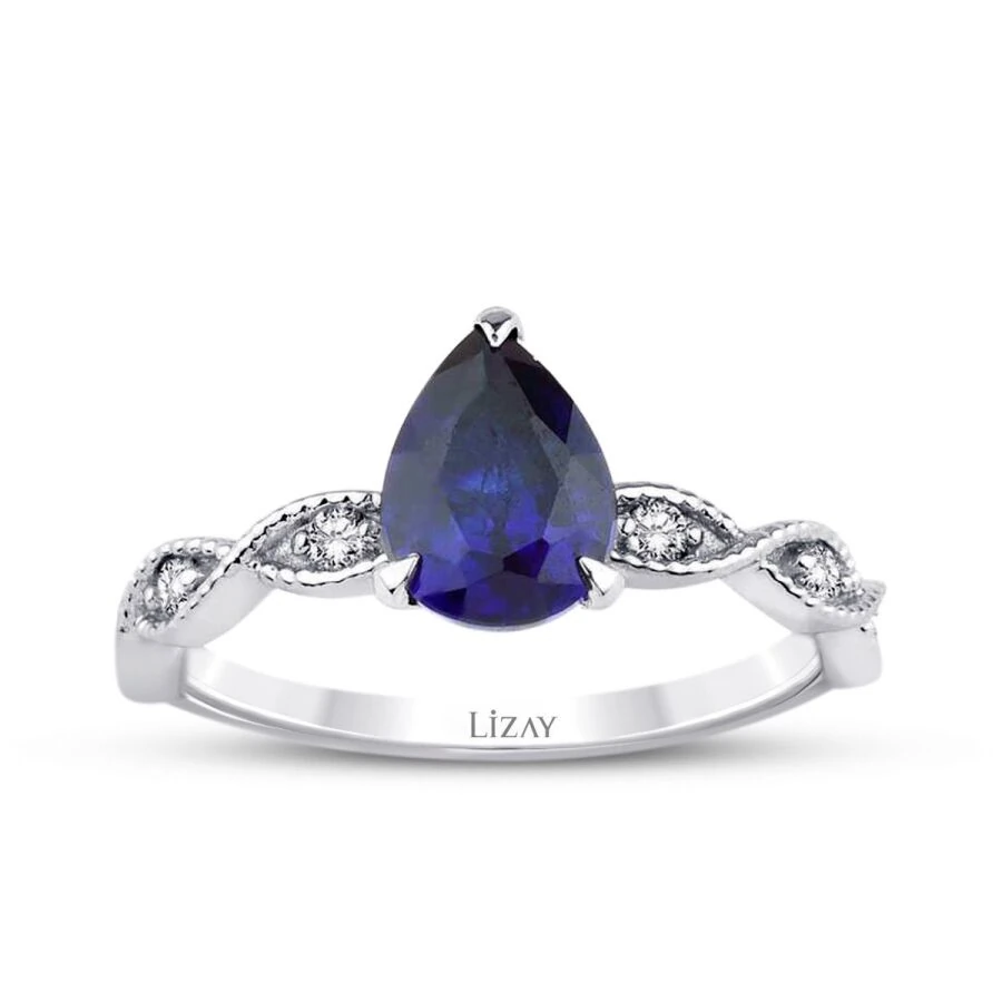 1.45 Carat Diamond Pear Sapphire Ring