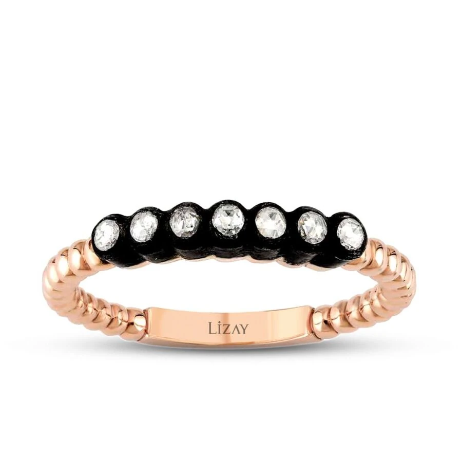 0.11 Carat Diamond Seven-Stone Ring