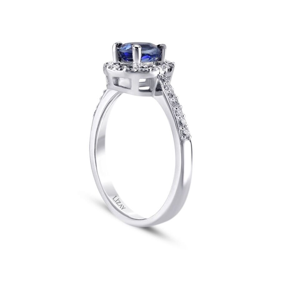 0.80 Carat Diamond Pear Sapphire Ring
