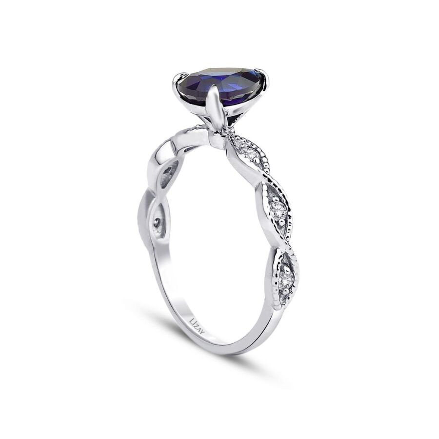 1.45 Carat Diamond Pear Sapphire Ring