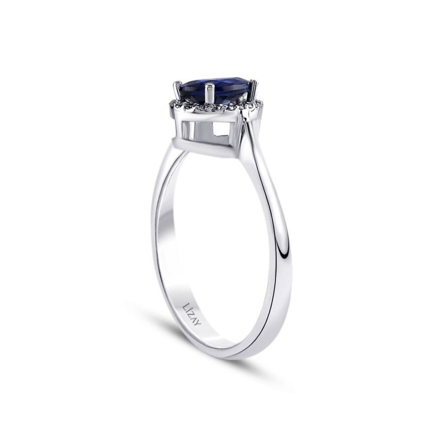 0.78 Carat Diamond Pear Sapphire Ring