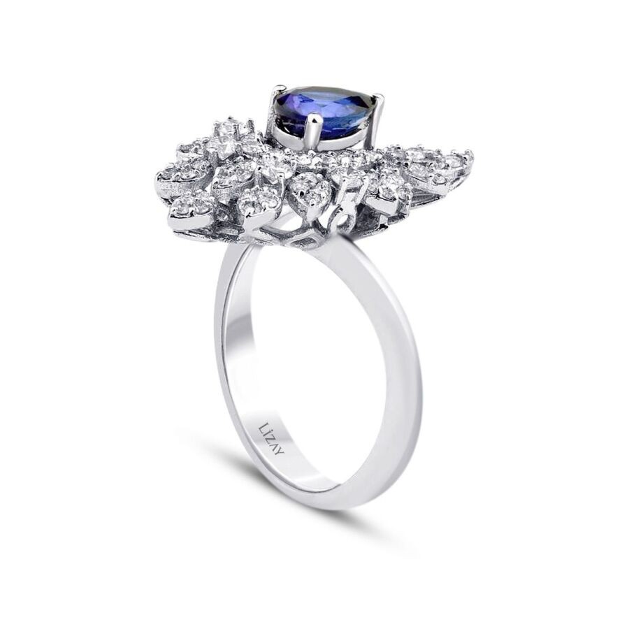 1.28 Carat Diamond Pear Sapphire Ring