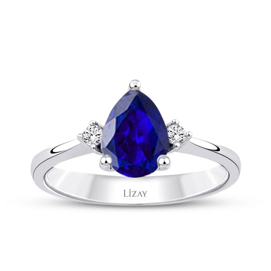 1.34 Carat Diamond Pear Sapphire Ring